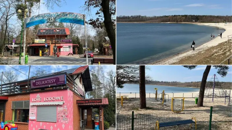 Przyjezierze jezioro z piaszczystą plażą, placem zabaw i sklepikami. W oddali widać las.